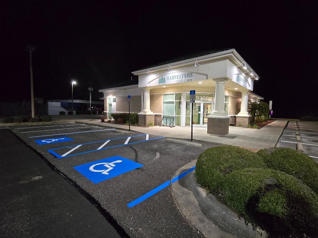 Exceptional Parking Lot Restoration: Asphalt Repairs, Crack Filling & Striping Completed in Pensacola, FL by Brynco Home Improvements LLC